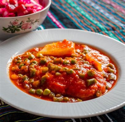  Bacalao a la Vizcaína: Une symphonie de saveurs marinées dans une danse de piment et d’oignon!